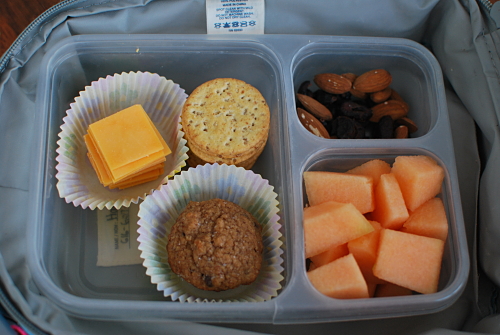 Cheese and Crackers, Mini Banana Chocolate Chip Muffin, Dried Cranberries and Almonds , Cantaloupe Chunks
