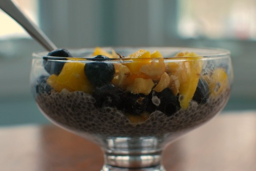 Chia Pudding with mango, blueberries, and walnuts