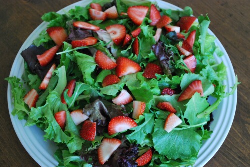 baby greens with strawberries